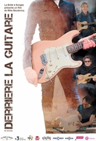 Derrière la guitare
